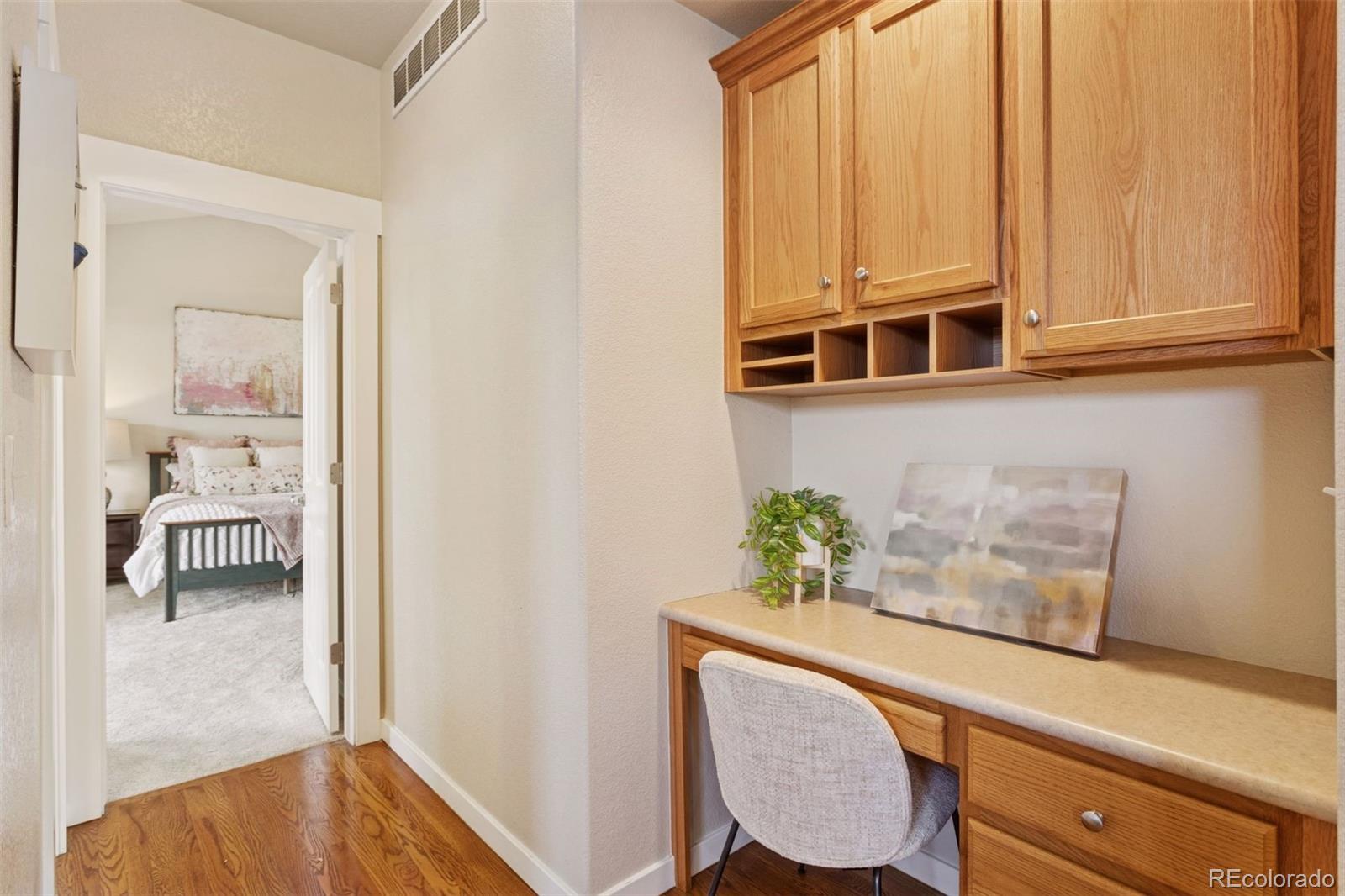 2882 Alton Street Denver, CO 80238 - Photo 12 of 42 view of living room with furniture and wooden floor