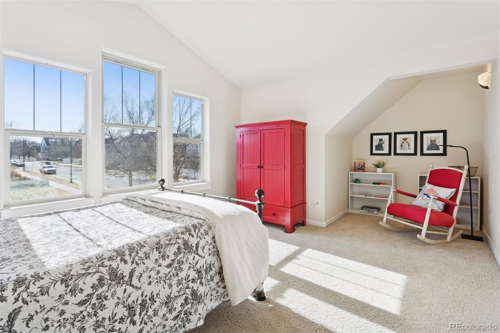 2882 Alton Street Denver, CO 80238 - Photo 24 of 42 a bedroom with a bed and window