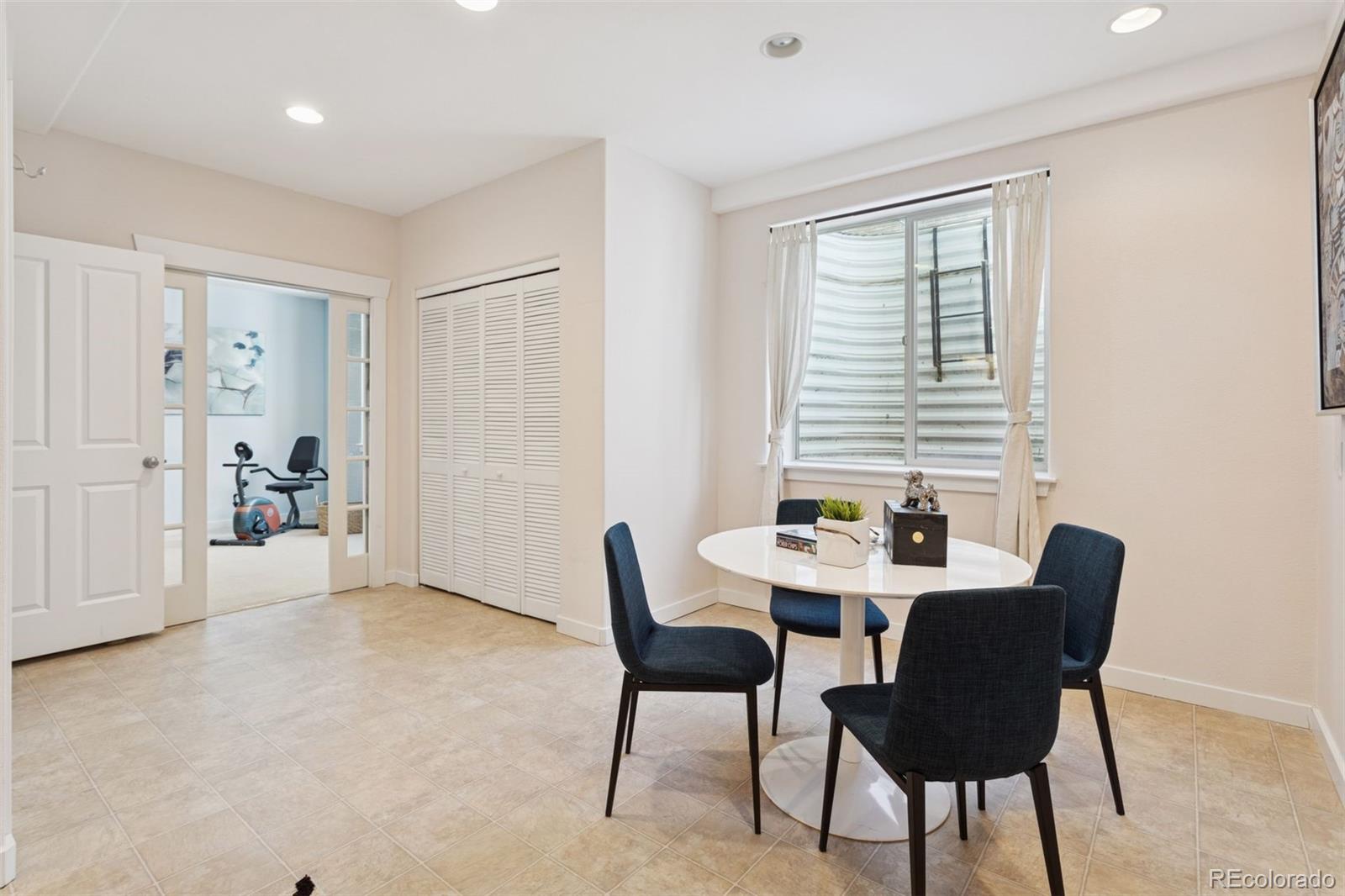 2882 Alton Street Denver, CO 80238 - Photo 27 of 42 a view of a livingroom with furniture and window