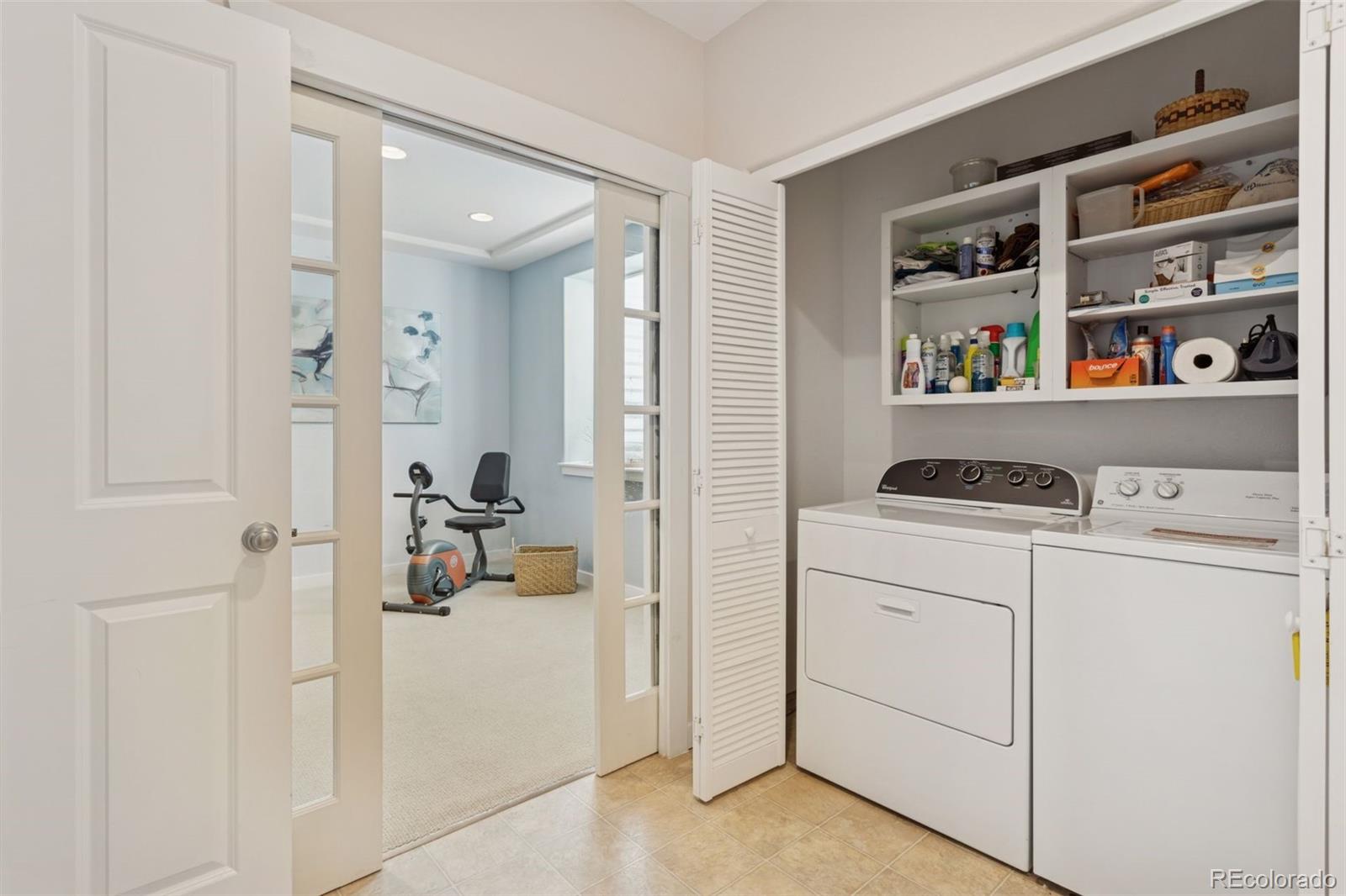 2882 Alton Street Denver, CO 80238 - Photo 29 of 42 a storage room with washer and dryer