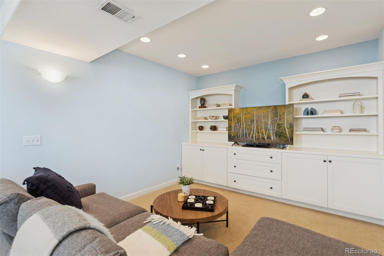 2882 Alton Street Denver, CO 80238 - Photo 30 of 42 a living room with furniture
