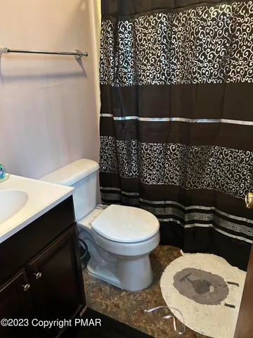 a bathroom with a sink and a toilet