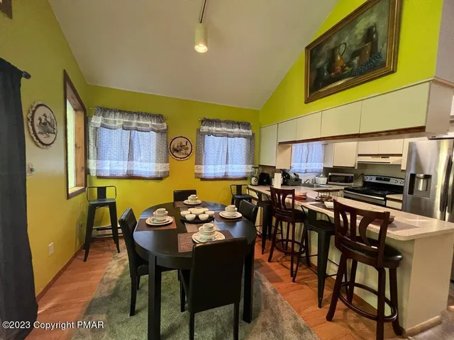a view of a dining room with furniture