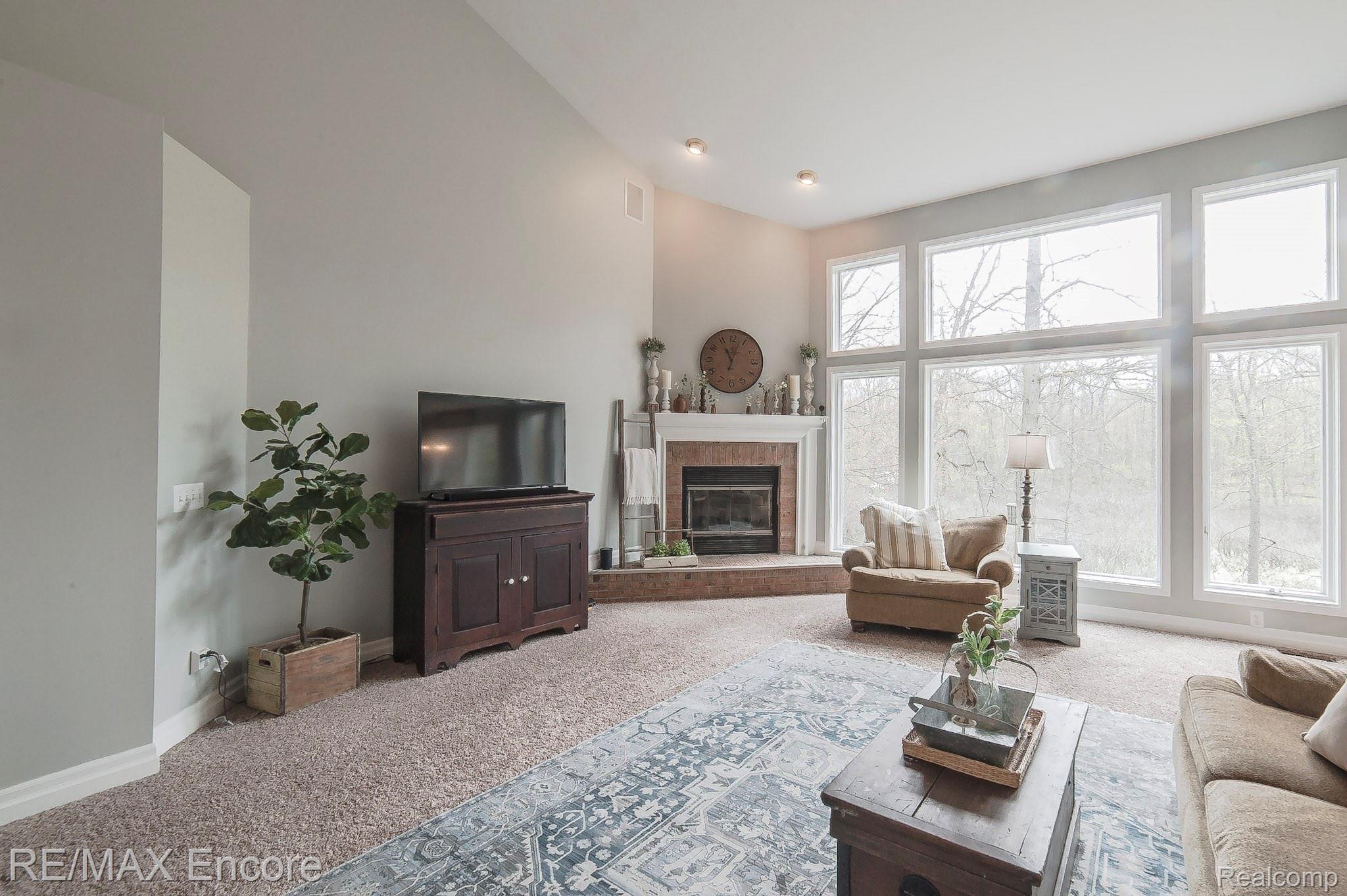 9785 Oakhill Road Holly, MI 48442 - Photo 10 of 43 Great Room w/Natural Fireplace