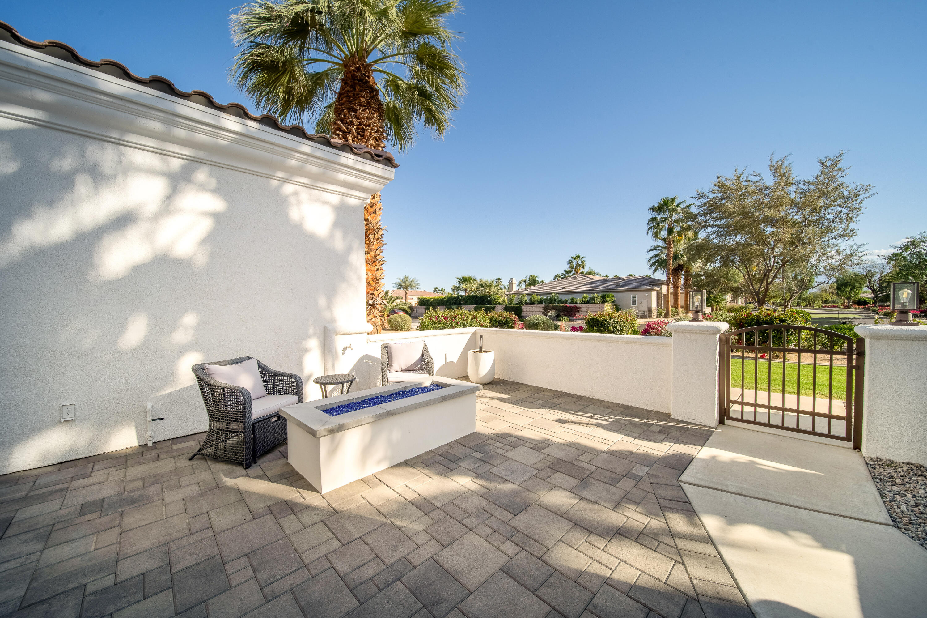 80262 Amazon Avenue Indio, CA 92201 - Photo 10 of 69 a view of a terrace with couches and sky view