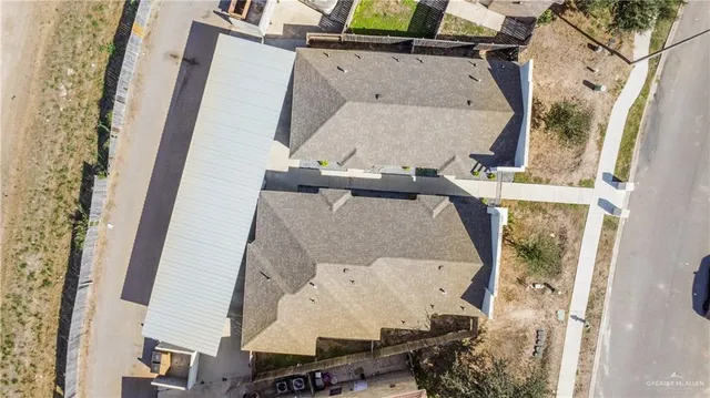 an aerial view of a highlighted house
