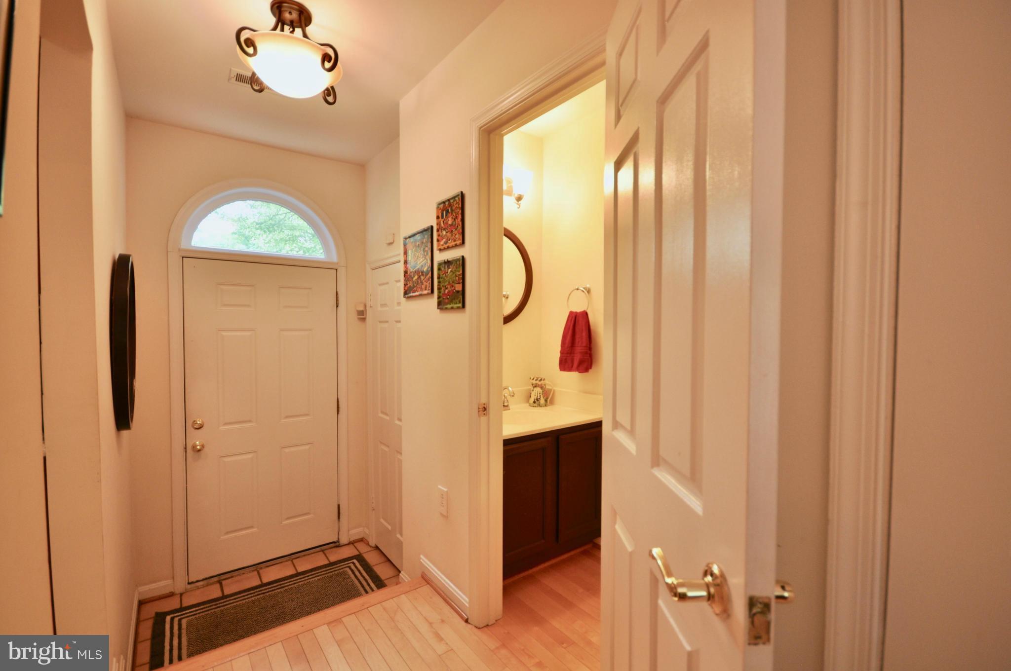 2822 Elliott Street Baltimore, MD 21224 - Photo 2 of 30 Entry Hall and Powder Room