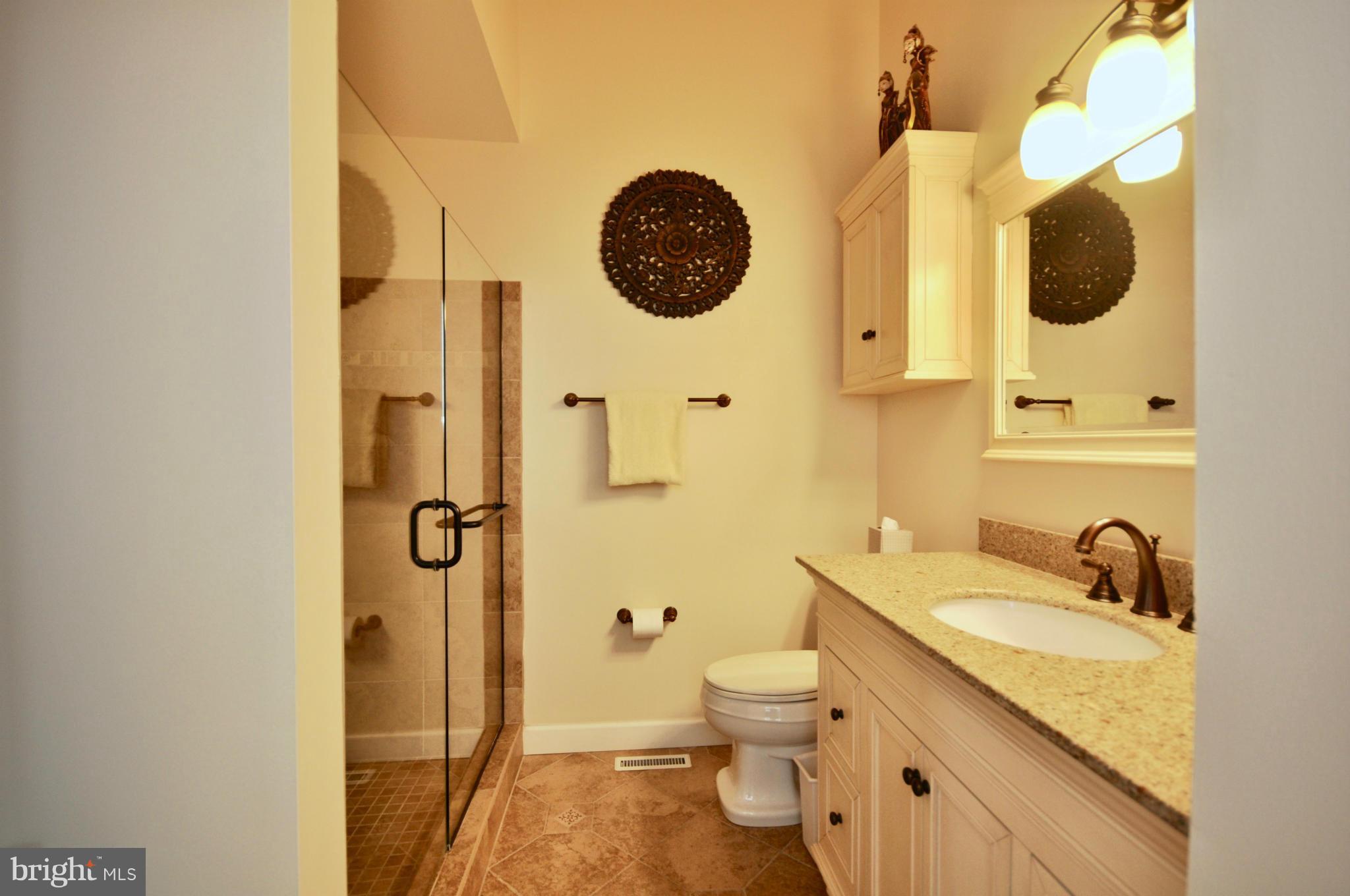 2822 Elliott Street Baltimore, MD 21224 - Photo 16 of 30 Dual Entry Bath with Doors to Hall and Bedroom