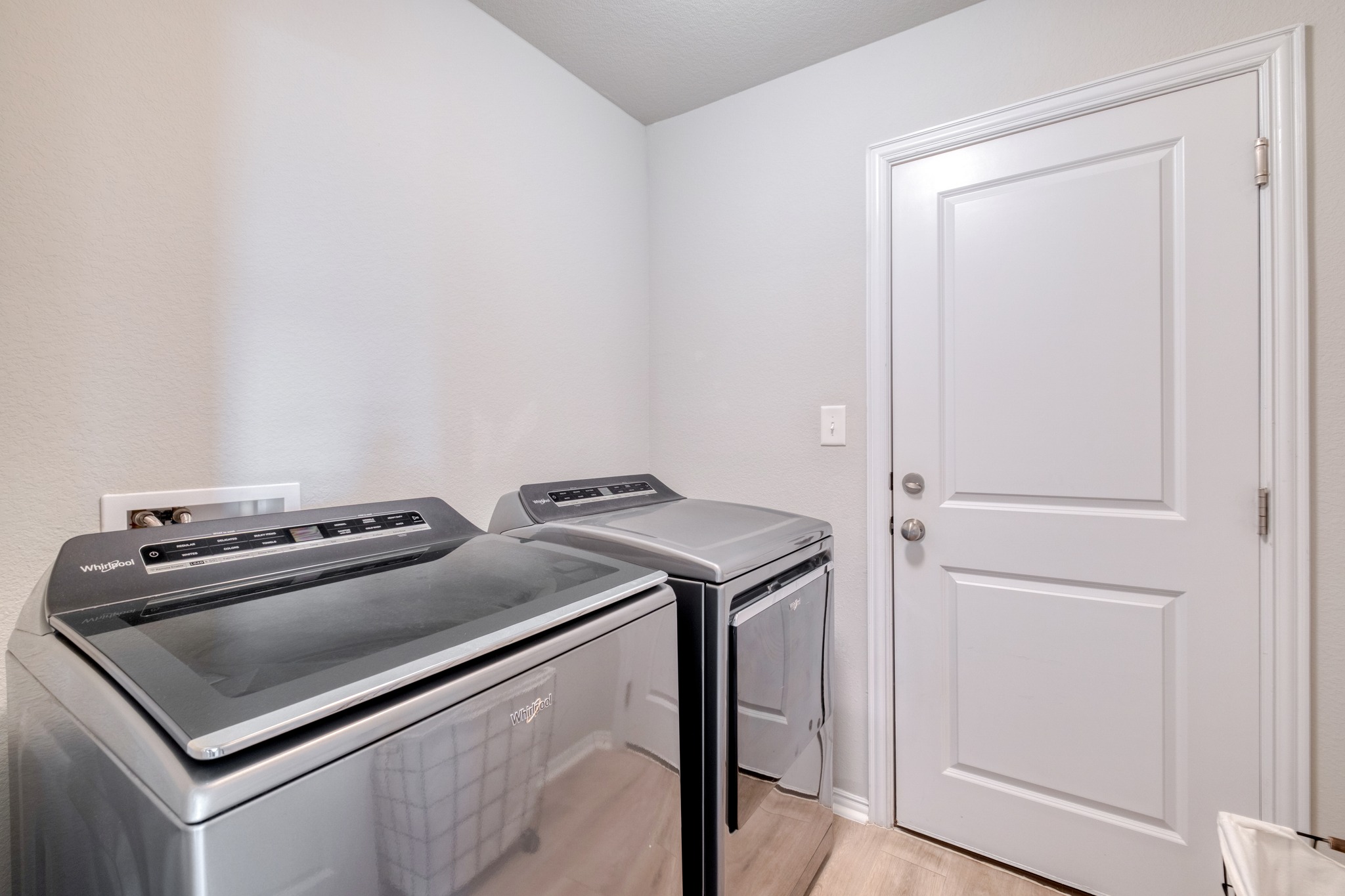 1000 Bright Star Cove Georgetown, TX 78628 - Photo 30 of 40 a utility room with dryer and washer