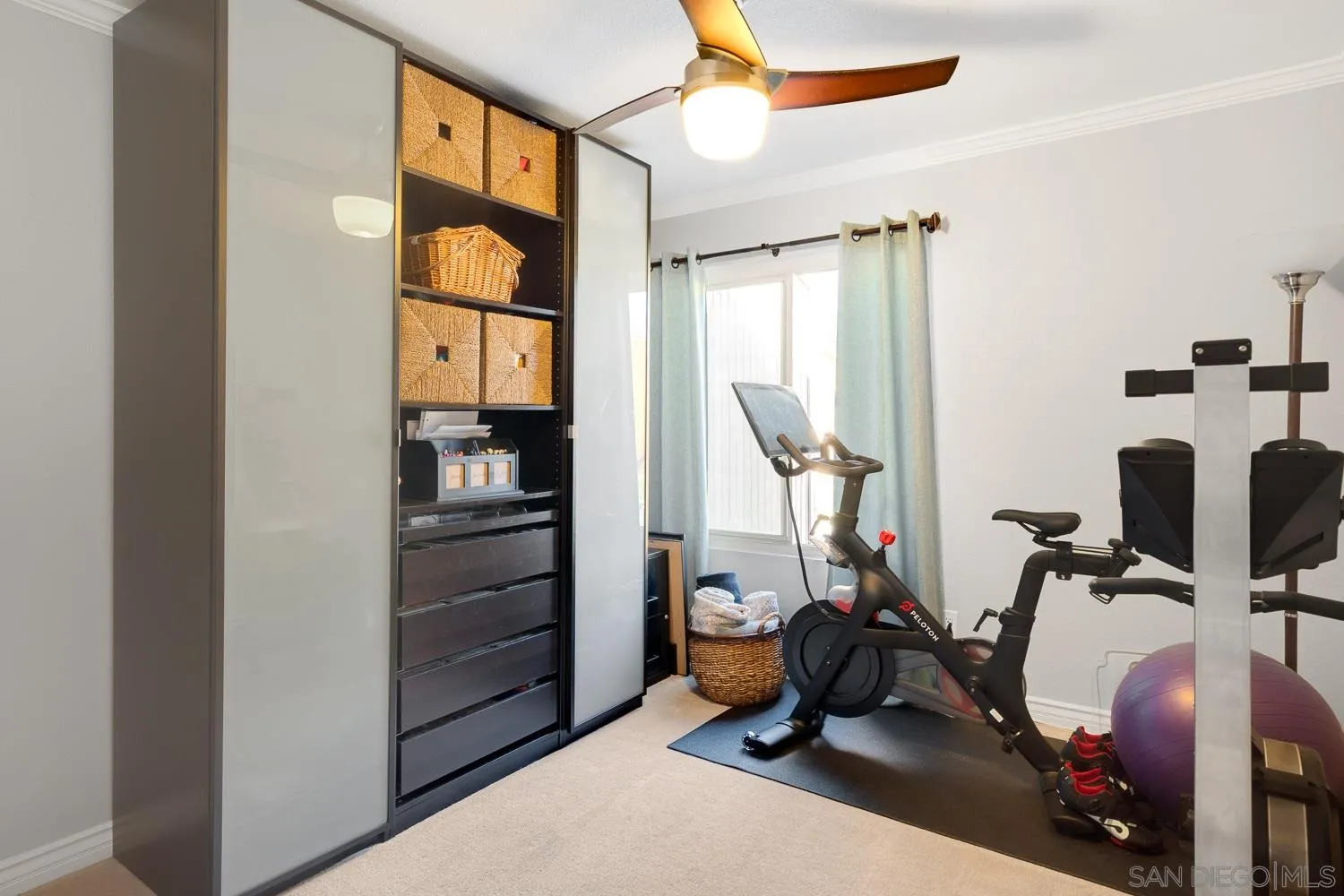 6052 Rancho Mission Road, Unit 408 San Diego, CA 92108 - Photo 14 of 36 a view of a room with gym equipment
