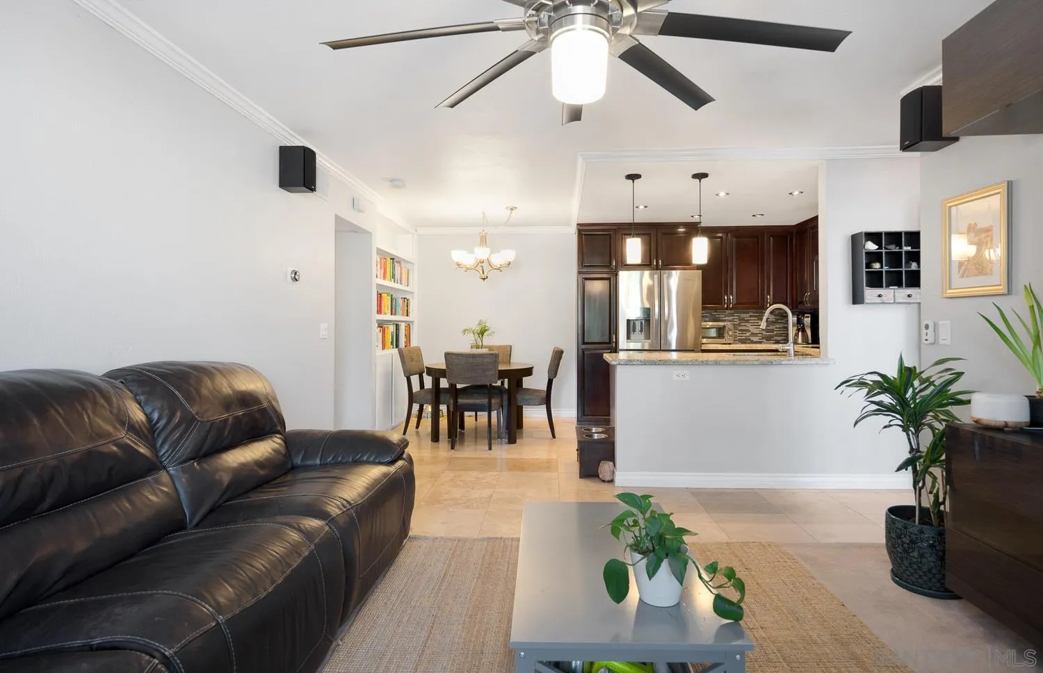 6052 Rancho Mission Road, Unit 408 San Diego, CA 92108 - Photo 3 of 36 a living room with furniture and a chandelier