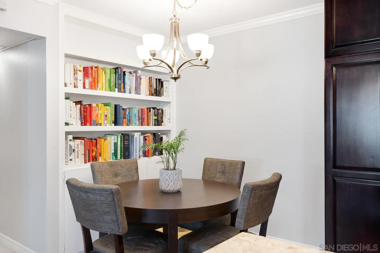 6052 Rancho Mission Road, Unit 408 San Diego, CA 92108 - Photo 6 of 36 a view of a dining room with furniture