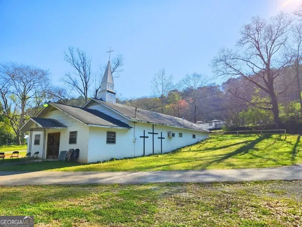 a view of a house with a swimming pool