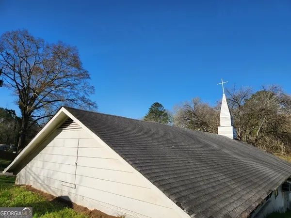 a view of backyard with green space