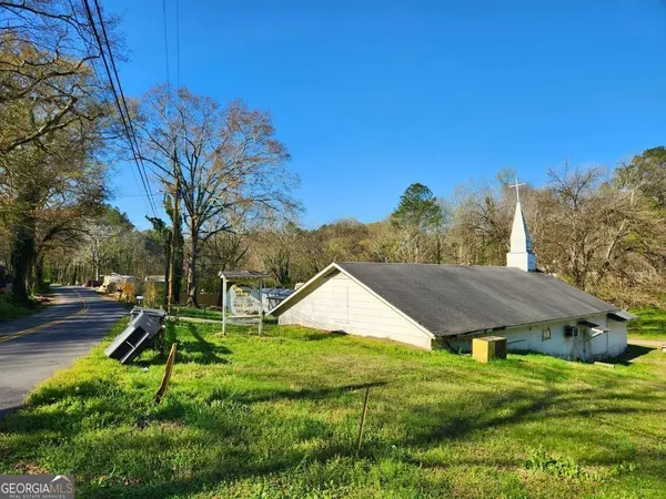 a view of a garden with an outdoor space
