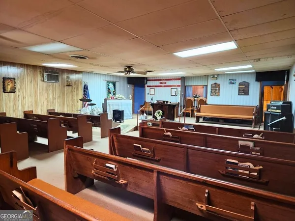 a kitchen with lots of counter space and stainless steel appliances