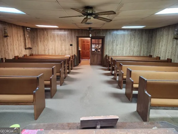 a outdoor space with lots of table and chairs