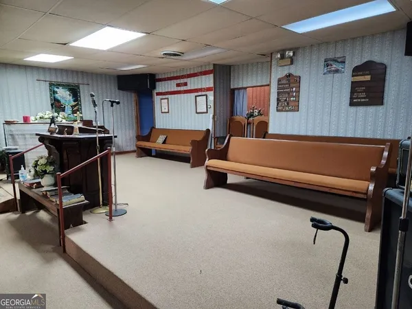 a view of kitchen with wooden floor