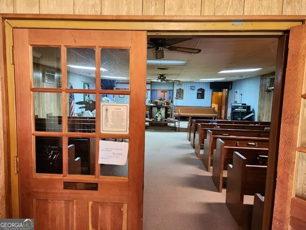 a view of living room and washer dryer