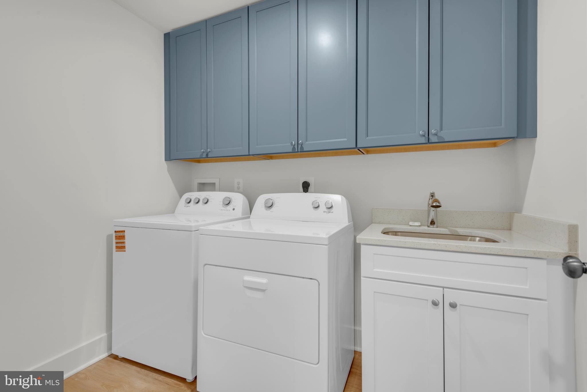 6502 Whitetail Xing Way Hanover, MD 21076 - Photo 32 of 58 a utility room with dryer and washer
