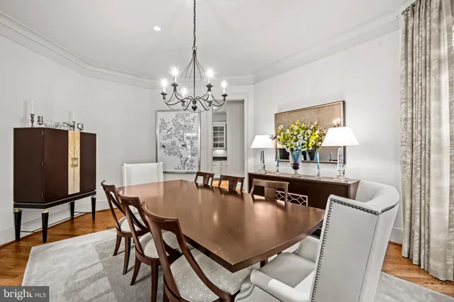 a view of an entryway with wooden floor and windows