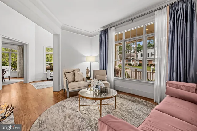 a living room with furniture and a rug