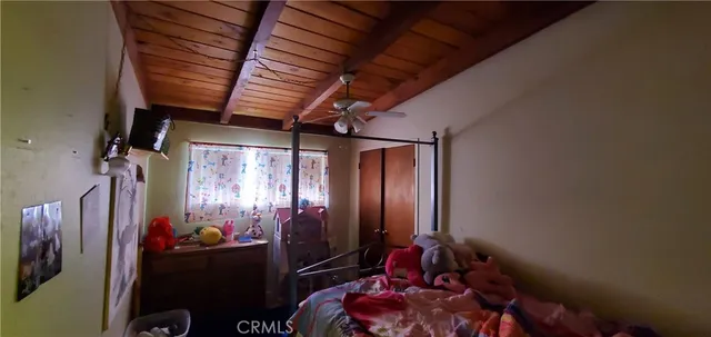 a room with furniture and wooden floor