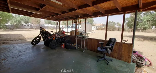 a view of street with sitting area
