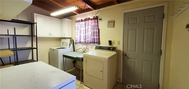 a room with sink and washing machine