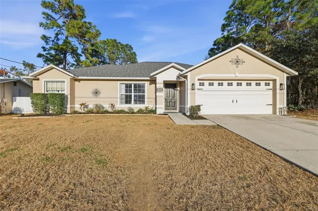 $295,000 | 11523 Norvell Road, Spring Hill, FL 34608