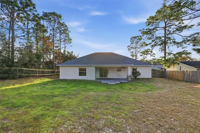 a house with a tree in front of it