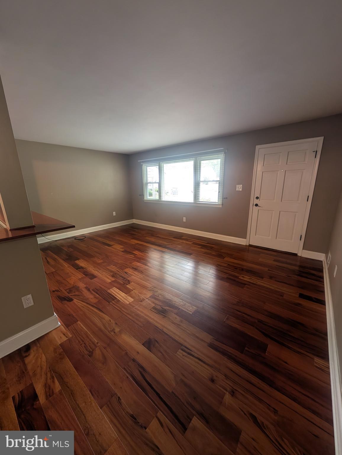7407 Castle Road Manassas, VA 20109 - Photo 2 of 21 Formal living room with hard wood floors