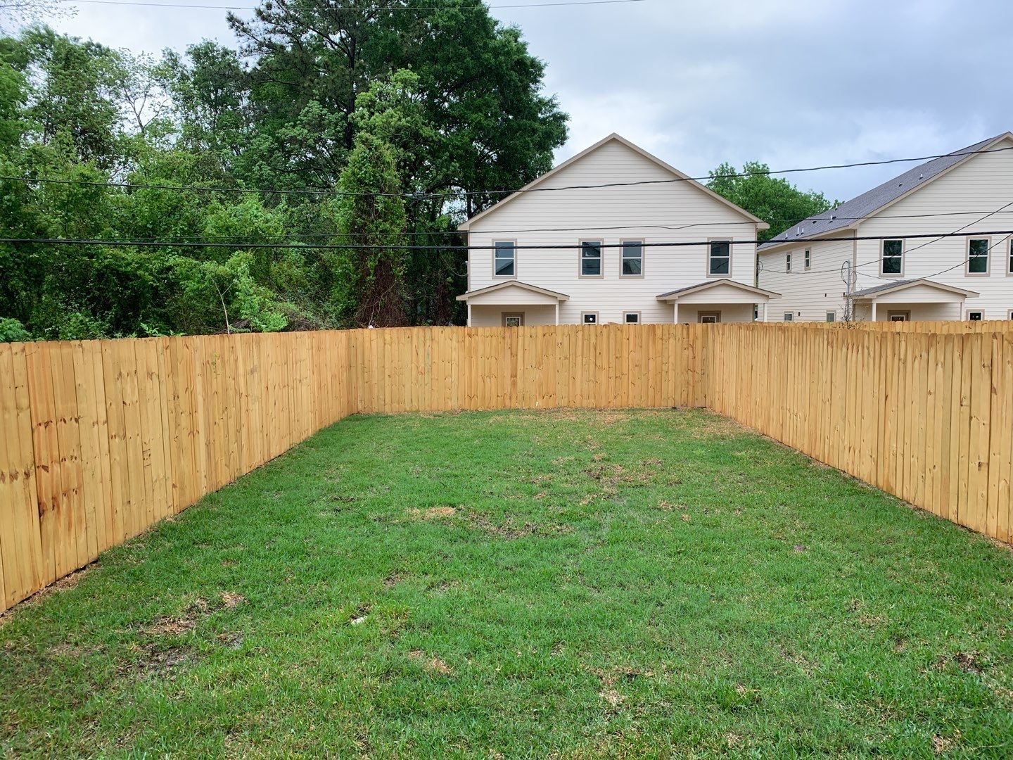 7966 Henson Street, Unit B Houston, TX 77028 - Photo 25 of 27 a front view of a house with garden