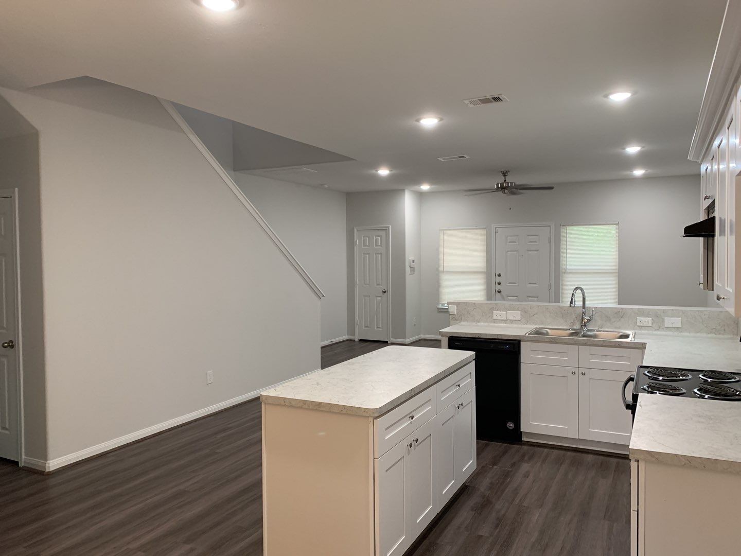 7966 Henson Street, Unit B Houston, TX 77028 - Photo 5 of 27 a kitchen with a sink stove and cabinets