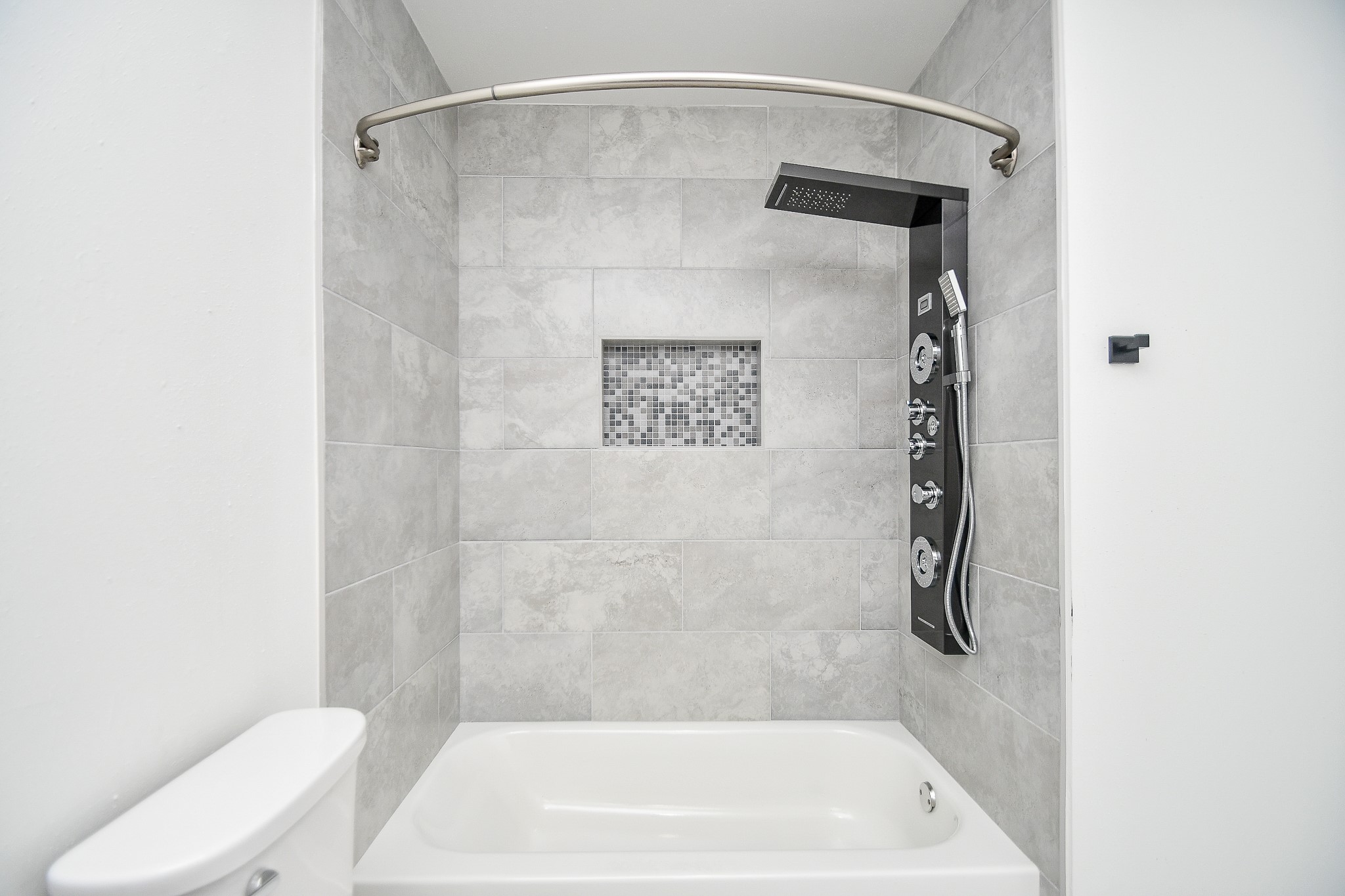 5801 Lumberdale Road, Unit 120 Houston, TX 77092 - Photo 37 of 45 a bathroom with a shower and a toilet