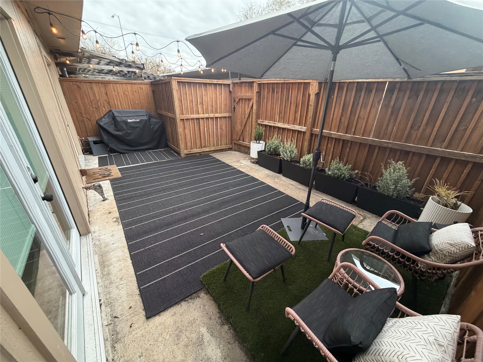 5801 Lumberdale Road, Unit 120 Houston, TX 77092 - Photo 41 of 45 a house with wooden floor outdoor seating and stairs