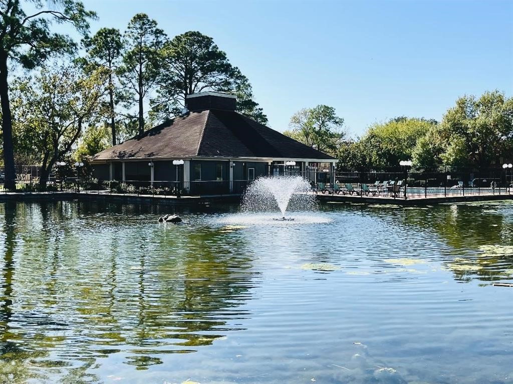 5801 Lumberdale Road, Unit 120 Houston, TX 77092 - Photo 5 of 45 a house with swimming pool in front of it