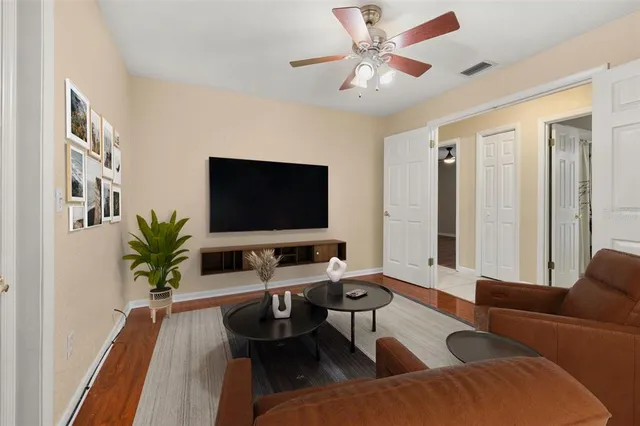 a picture of a bathroom with a shower