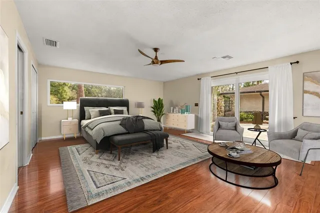 a view of a lake with houses in the back