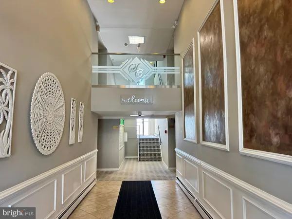 a view of a hallway with entryway