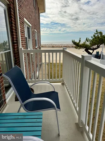 a view of balcony with furniture