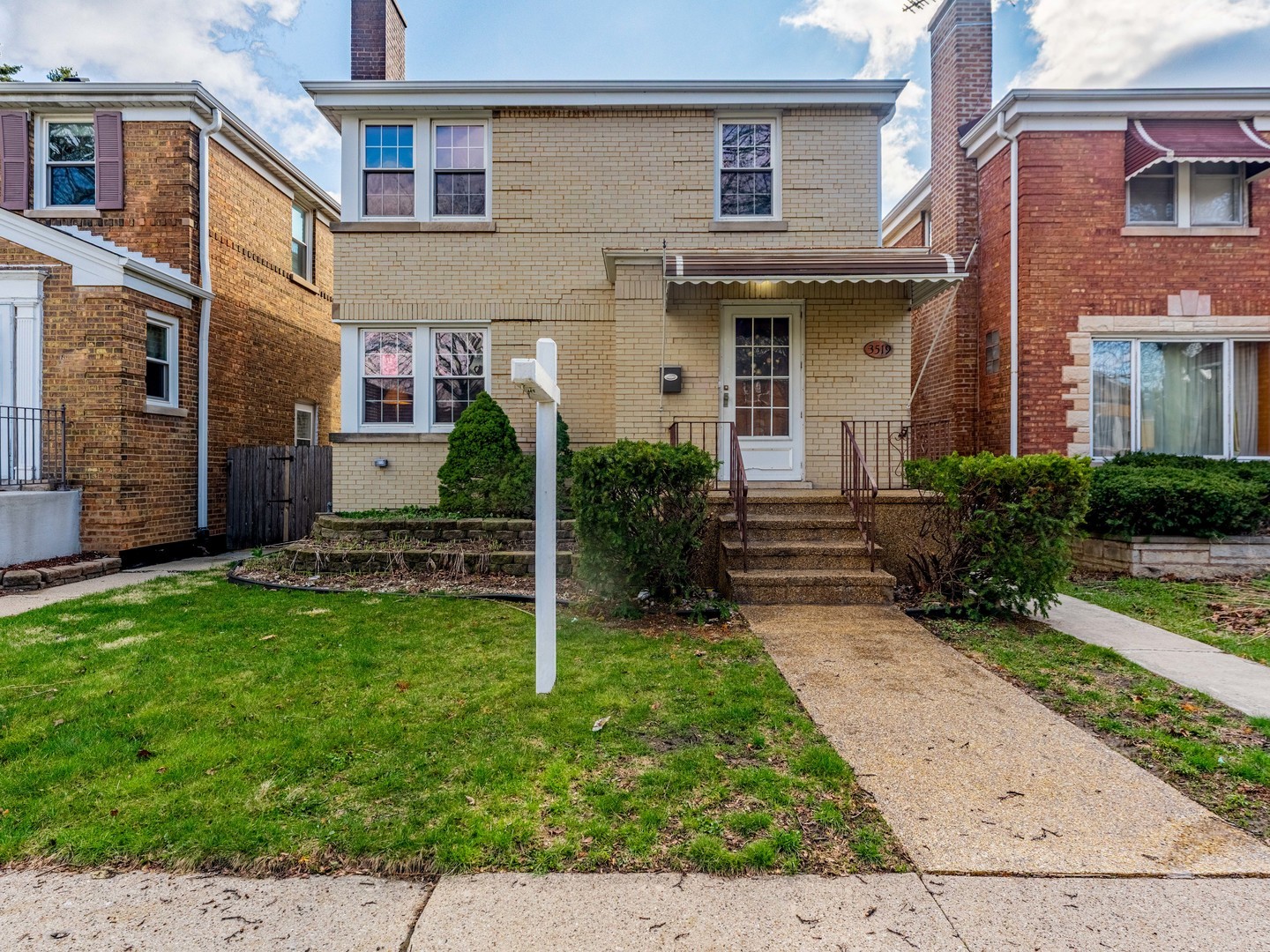 3519 Ridgeland Avenue Berwyn, IL 60402 - Photo 27 of 29 a view of a brick house with a yard and plants