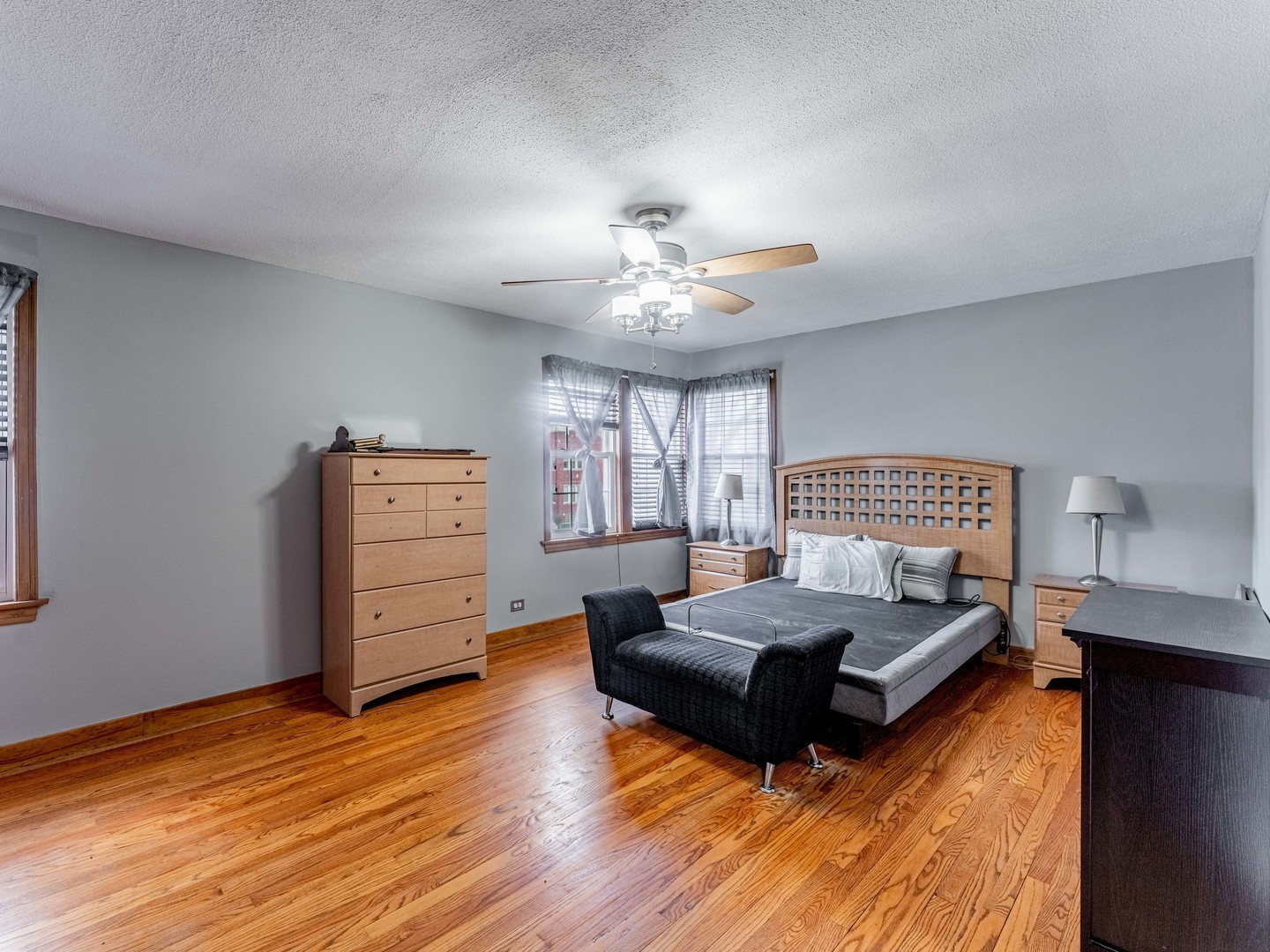 3519 Ridgeland Avenue Berwyn, IL 60402 - Photo 10 of 29 a spacious bedroom with a bed and window