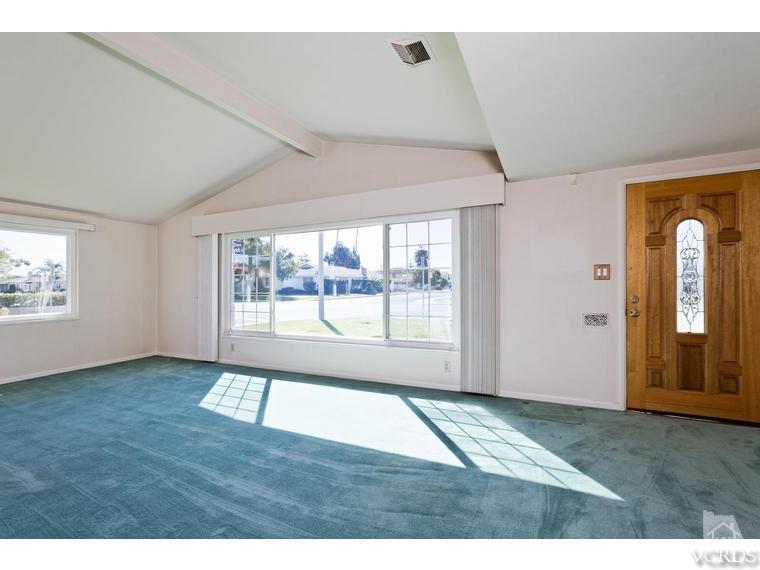 805 West Roderick Avenue Oxnard, CA 93030 - Photo 4 of 24 a view of an empty room with a window