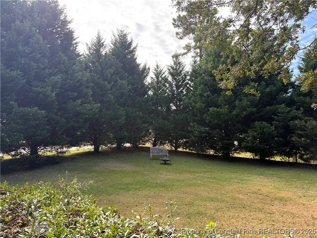 an aerial view of lake residential house with outdoor seating