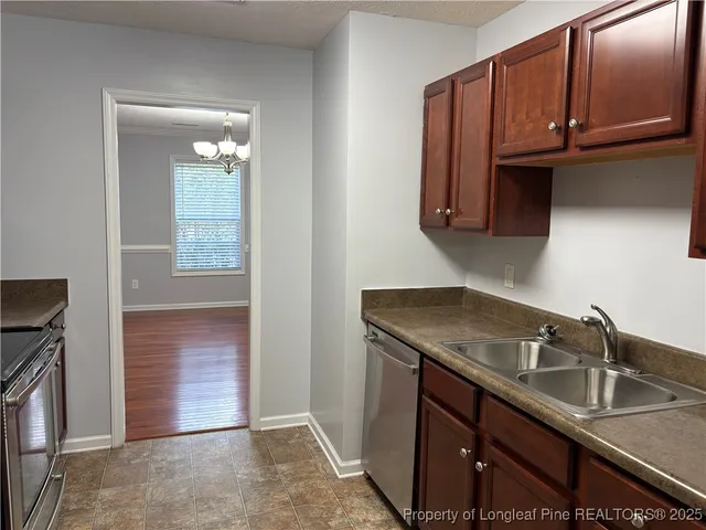 a view of a sink and a mirror