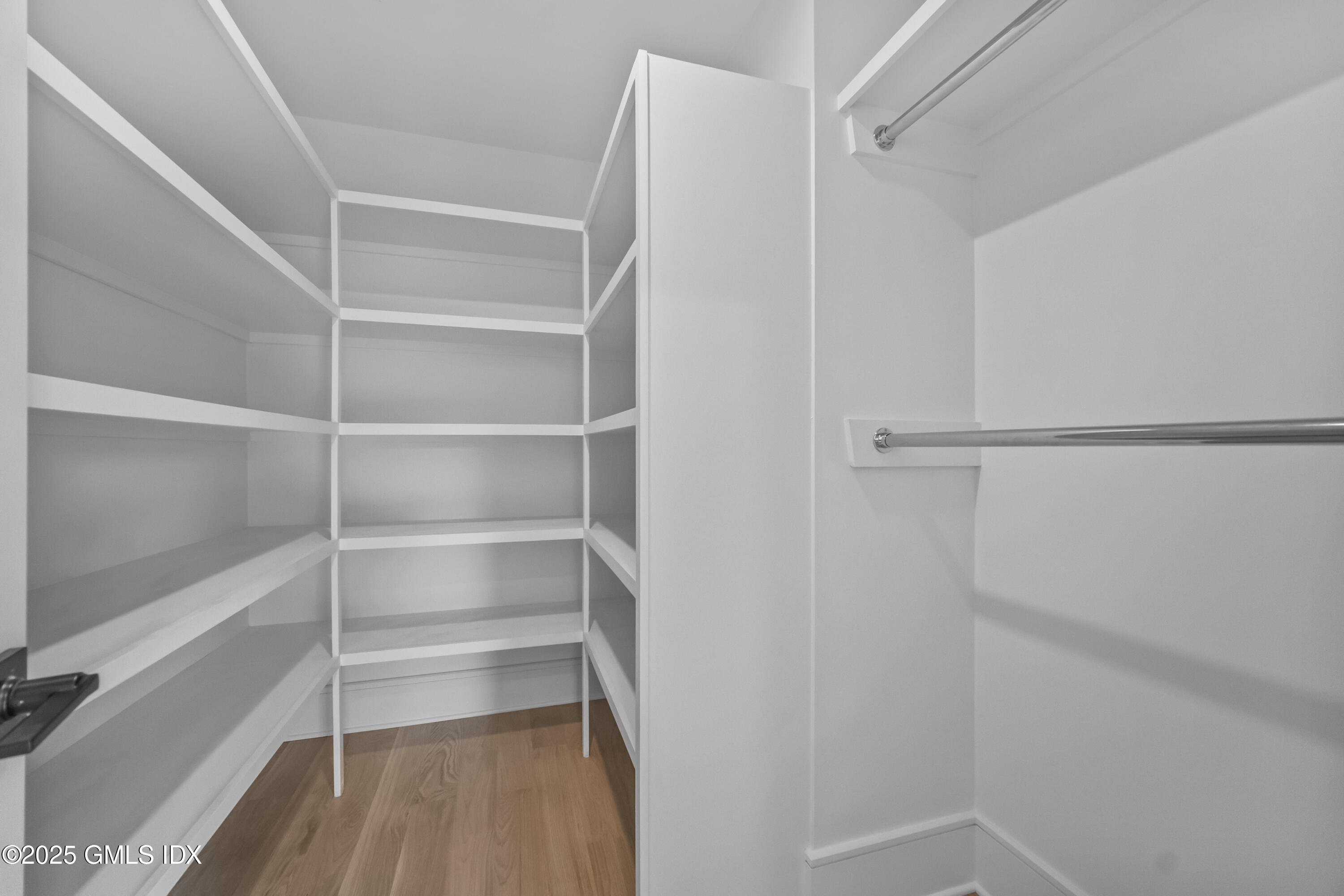 71 Old Field Point Road Greenwich, CT 06830 - Photo 16 of 33 a view of walk in closet with empty racks