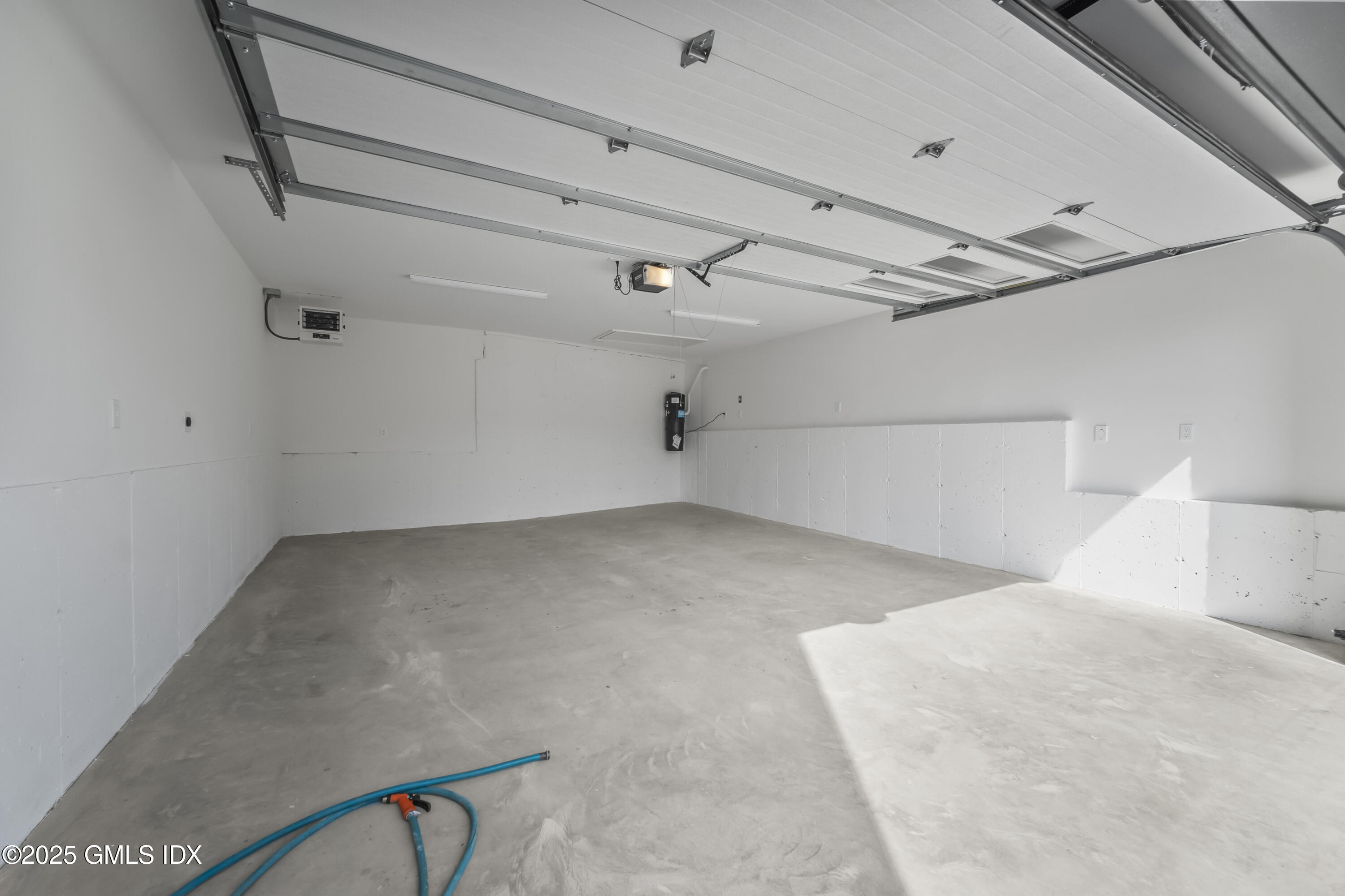 71 Old Field Point Road Greenwich, CT 06830 - Photo 2 of 33 a view of a room with racks on the wall