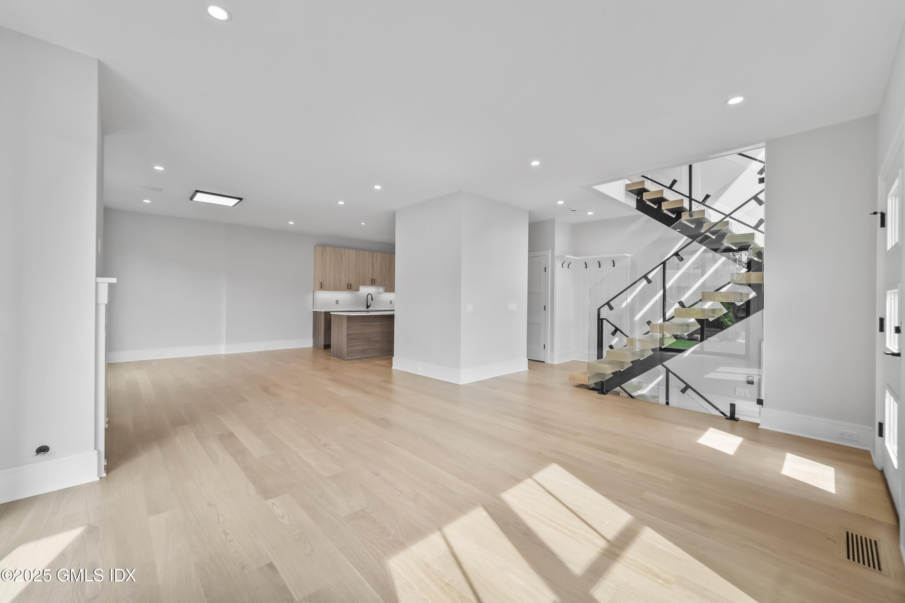 71 Old Field Point Road Greenwich, CT 06830 - Photo 4 of 33 a view of entryway and kitchen