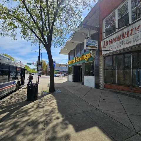 a view of a building with sitting area